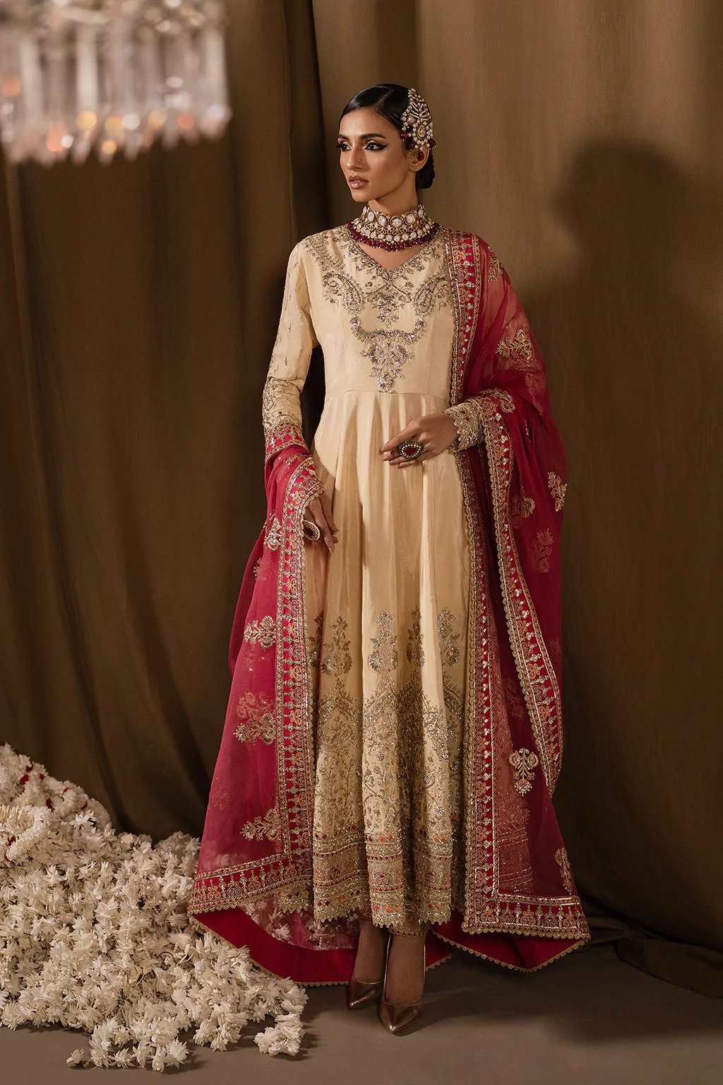 Raqs Divani Afrozeh's soft beige-hued 3pc is available on Shelai