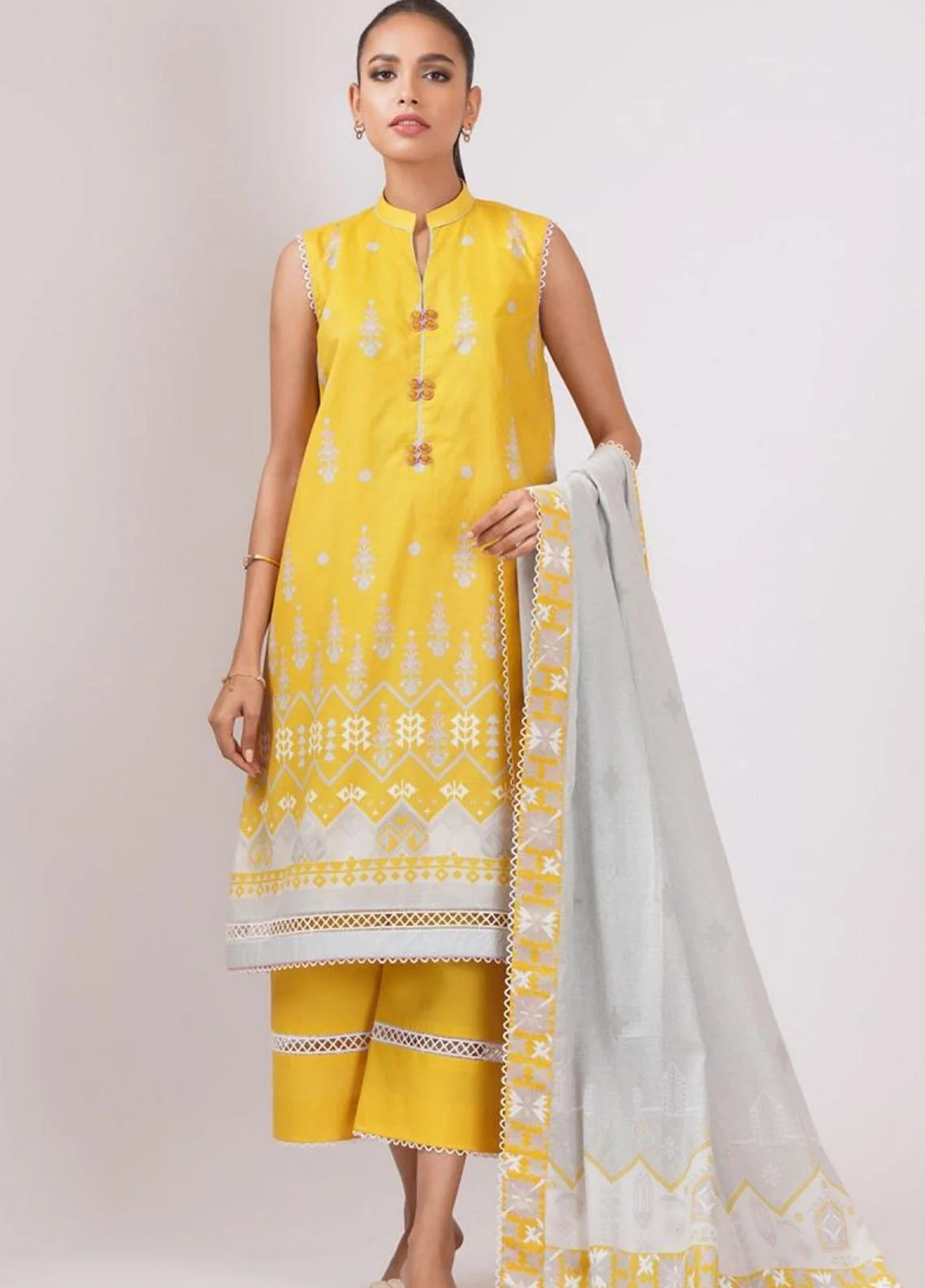 Alkaram Studio yellow 3 pieces available in Shelai SS-38.1-22